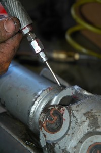 A needle adapter to our grease gun is used to lube the fitting inside the CV joint.