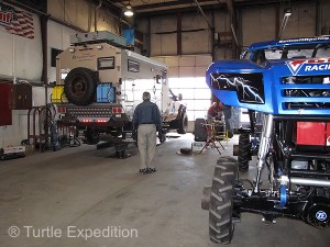 The big hydraulic floor lift at Midwest Four Wheel Drive, home of Bigfoot, had no problem lifting The Turtle V.