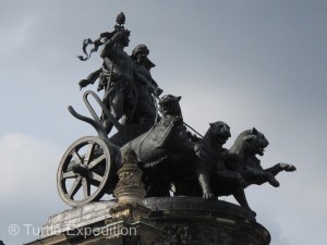 This neo-classic statue resides high above the Semperoper's entry halls.