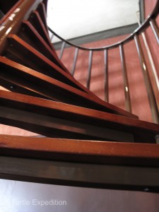 Narrow houses give rise to narrow spiral staircases. One side of these staircases becomes increasingly narrower and you really need to watch your step before it disappears.
