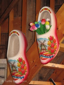 For the tourists, clogs have many uses beyond working in the farmyard.