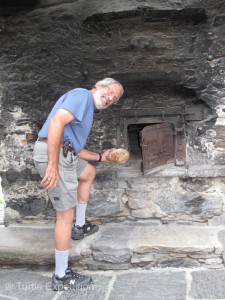 A community oven bakes fresh bread twice a month in the traditional way.