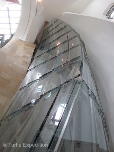 The interior glass walls of the Guggenheim Museum seem to defy the limits of structural engineering.