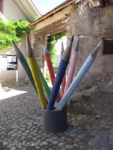 Modern art in front of the village school next to the castle.