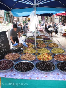 Olives galore. All one price by the scoop or kilo.
