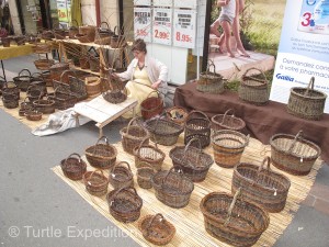 Artists like this basket weaver sell their crafts. Wish we had room to take a few home.