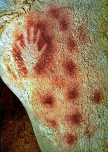 This prehistoric hand print's artist blew ground iron ore around his hand.