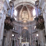 The basilica includes six historical pipe organs, two of which are seen here.