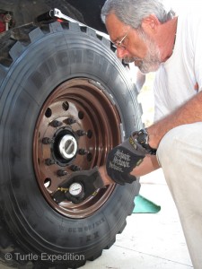 Rotating five 180-lb tires and checking the torque on the wheels and the pressures are easier in the comfort of a modern RV park.