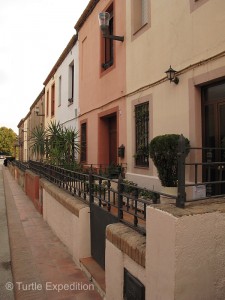 This typical street of Colónia Güell reminded us of England.