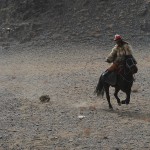 The beginning of the contest starts with the hunter dragging a dead rabbit or fox skin behind the horse. The eagle is visible on the left.