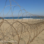 Coils of razor wire on the beaches and serious fences along coastal highways left no doubt that there was still a real threat from invading North Koreans.
