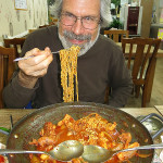 Gary was still learning to eat with chopsticks.