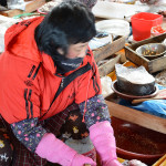 Service is everything. You buy a fresh fish, the women will quickly clean and gut it while you wait.