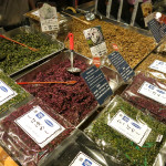 The center dish is made from a kind of vegetable called Mozawana, used for a topping on rice or pasta. To the right is a mixture of eggplant, cucumber, ginger and sesame, often used for making rice balls.