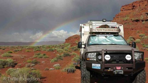 After the 2015 Overland Expo in Arizona we camped with friends at Valley of the Gods when a sudden rain squall/storm swooped over us and then surprised us with a double rainbow. To keep the heat (and sometimes eyes) out of the cab, we always cover the windows on the inside.