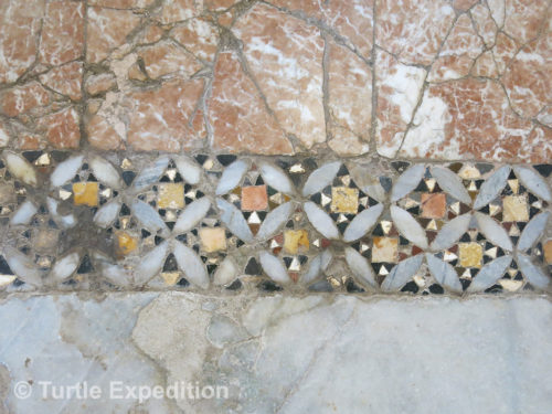 The beautiful opus sextile patterns on the pavements and interior walls of the church are examples of the skilled craftsmanship.