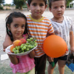 We had just parked when this young girl, her brother and his friend arrived to welcome us with a bowl of fruit.
