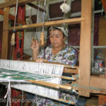 Though some of the weaving is done on machines much of the beautiful silk patterns are still woven on the old fashion handlooms.