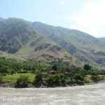 On the Afghanistan side of the river we could see hand build rock homes mixed with third-world adobe houses with straw roofs.