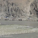 From our view on the hillside we watched the big semi tractor-trailers inching along the side of the cliff above the river and wondered how they passed each other.