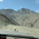 In the distance we could see the road as it snaked along the cliffs above the canyons far below us.