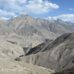 On the barren hillsides around us we could see foot trails leading down to the river far below.