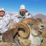Hunters posing with their Marco Polo Bighorn Sheep trophy. Photo from the internet.