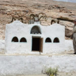 This roadside shrine was adorned with Marco Polo sheep horns.