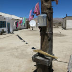 Searching for a hot spring, we stopped at this village to ask fordirections. It was interesting to see this classic Russian style water basin on a post.