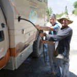 This farmer joyfully helped us fill our water tank with his old garden hose. We didn’t have enough hands to plug all the holes! To replace it was too expensive for him and he had to travel to Khorog, three hours away, to get it. As a thank you we presented him with the amount he needed to buy a new one.