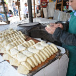 Little pastries filled with meat and vegetables and baked on the spot made a good substitute for a Big Mac.