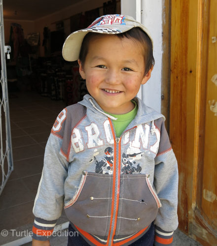 Little boys like their baseball caps.