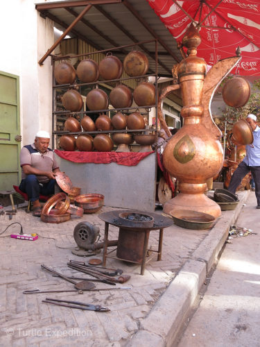 At Kashgar's Copper Market craftsmen were still using traditional hand tools.