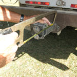 This practical tool called Macs Trail D-Vise is mounted at the rear bumper trailer hitch mount.