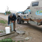 We filled up our water one more time. Our cheater-hose would not fit this faucet so we used the bucket and a funnel.