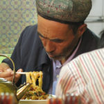 You need to know how to eat long noodles with chopsticks.