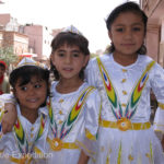 These girls are dressed up in local costumes.