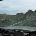 Back on the road, we crossed over a rocky range of low mountains and dropped back down into the Taklamakan desert.