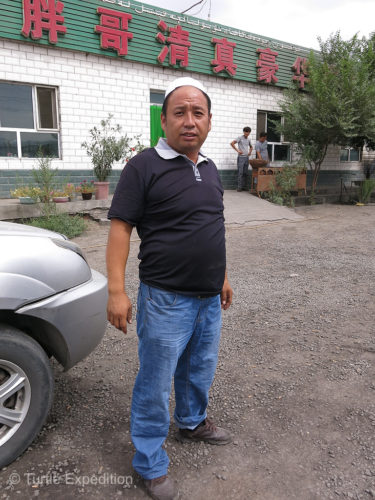 This is the proud owner of the Fat Man Restaurant in Kumux, southwest of Turpan.