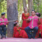 Talented musicians were playing traditional instruments while dancers sang folk songs.