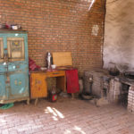 Kitchen, bedroom and dining room all outside in the cool air.