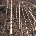 Grapes are hung on these racks and suspended inside the drying buildings.