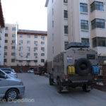 Our hotel “room” in Dunhuang was quiet and guarded, but maybe a little tight.