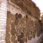 These carefully hand-shaped cow dung patties were slapped on walls everywhere, drying for use as winter fuel we assumed or maybe cooking as well.