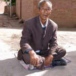 I wish I could comfortably sit like this gentleman for hours.