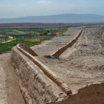 Standing on top of the Jiayuguan Fortress, the Great Wall stretched into the horizon.