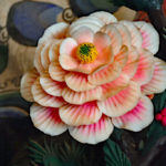 These intricate flowers were carved from yak butter for a specific festival. Yes, the room was cold.