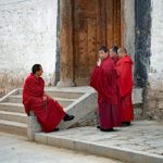 Monks do not have to work. Their life is supposed to be all about prayer. No attachment to physical material things. They live off donations.