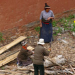 People were busy chopping firewood.